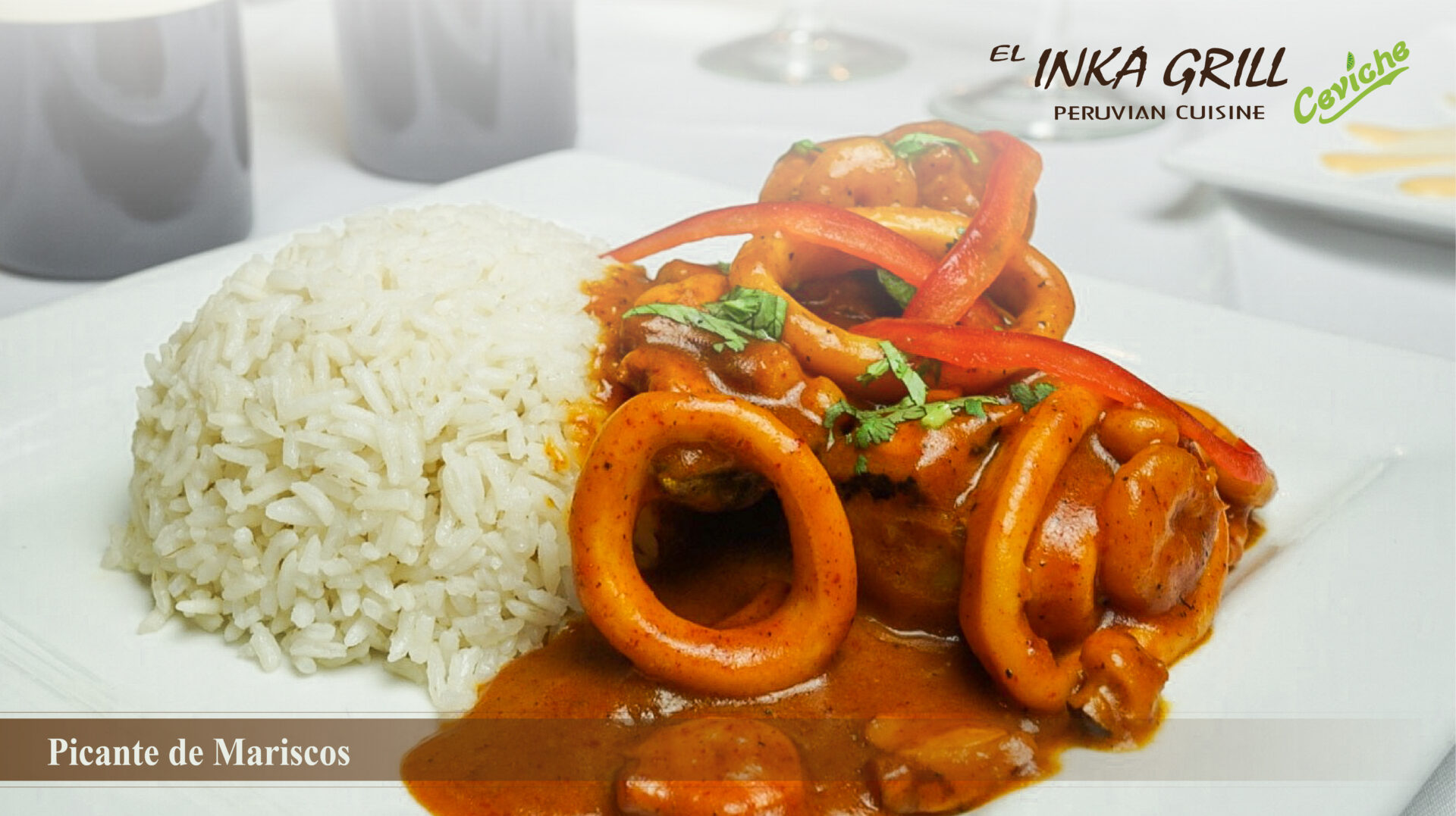 A plate of food with rice and meat.