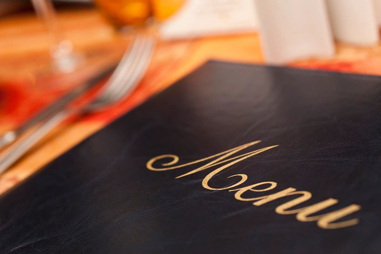 A close up of the menu on a table