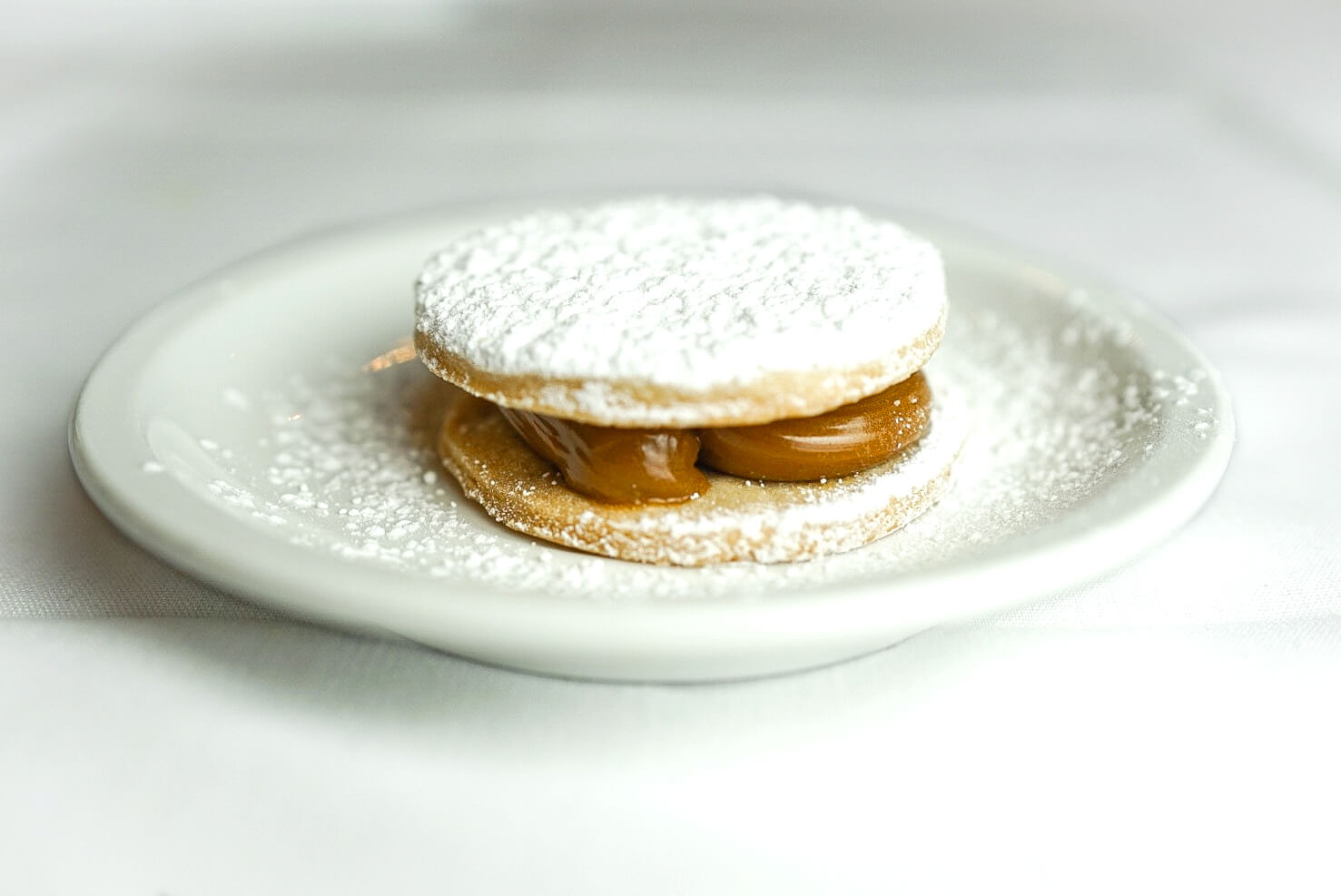 A white plate with some food on it