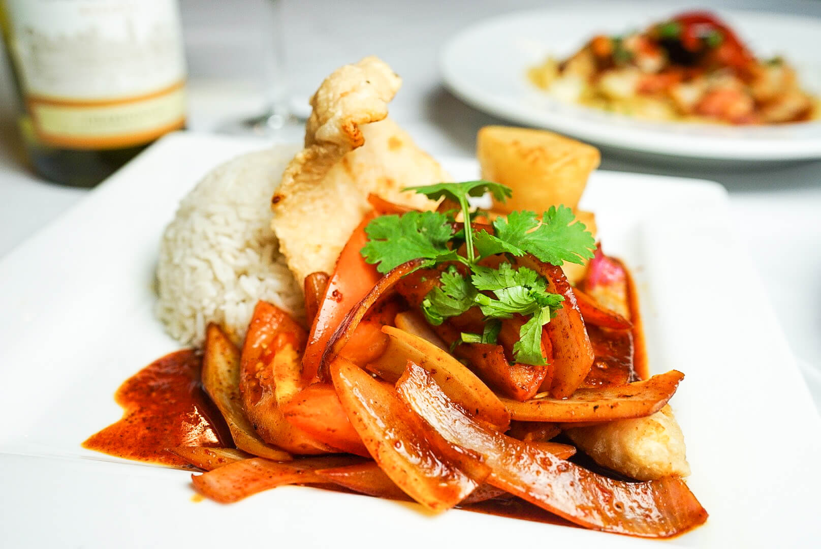 A plate of food with rice and vegetables on it.