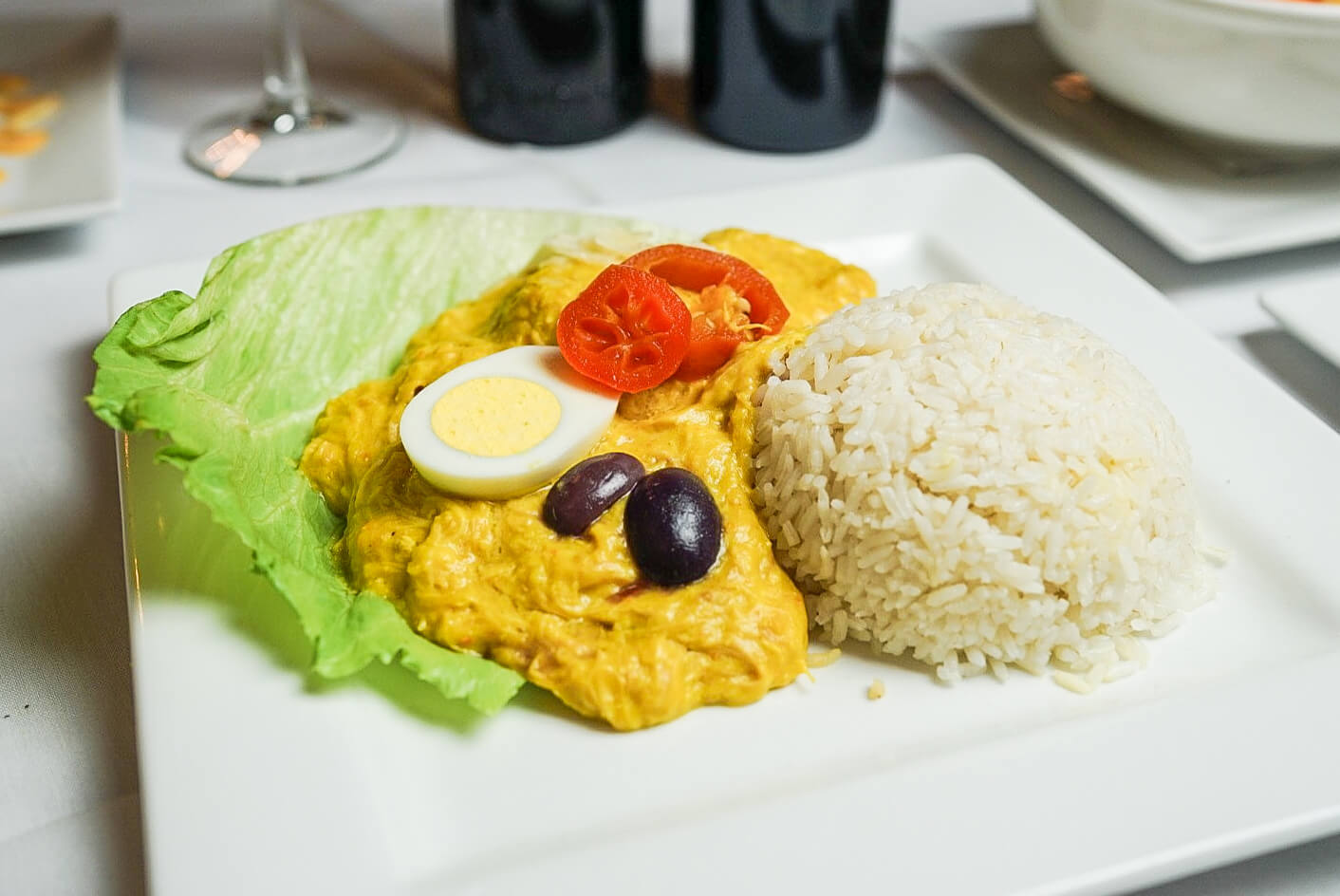 A plate of food with rice and vegetables on it.